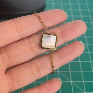 Stainless steel mother of pearl slide bracelet